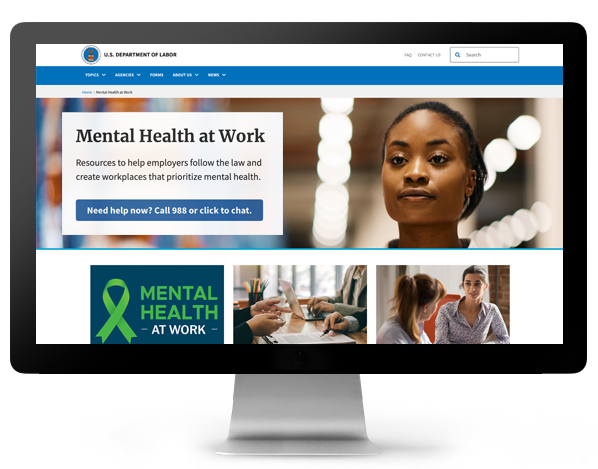 Desktop computer with the Department of Labor's Mental Health at Work Landing page